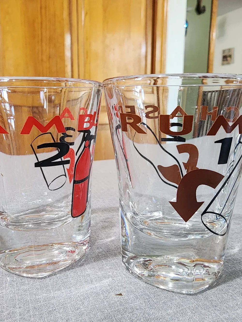 Clear Glass Shot Glasses with Multicolor Icons - Set of 4